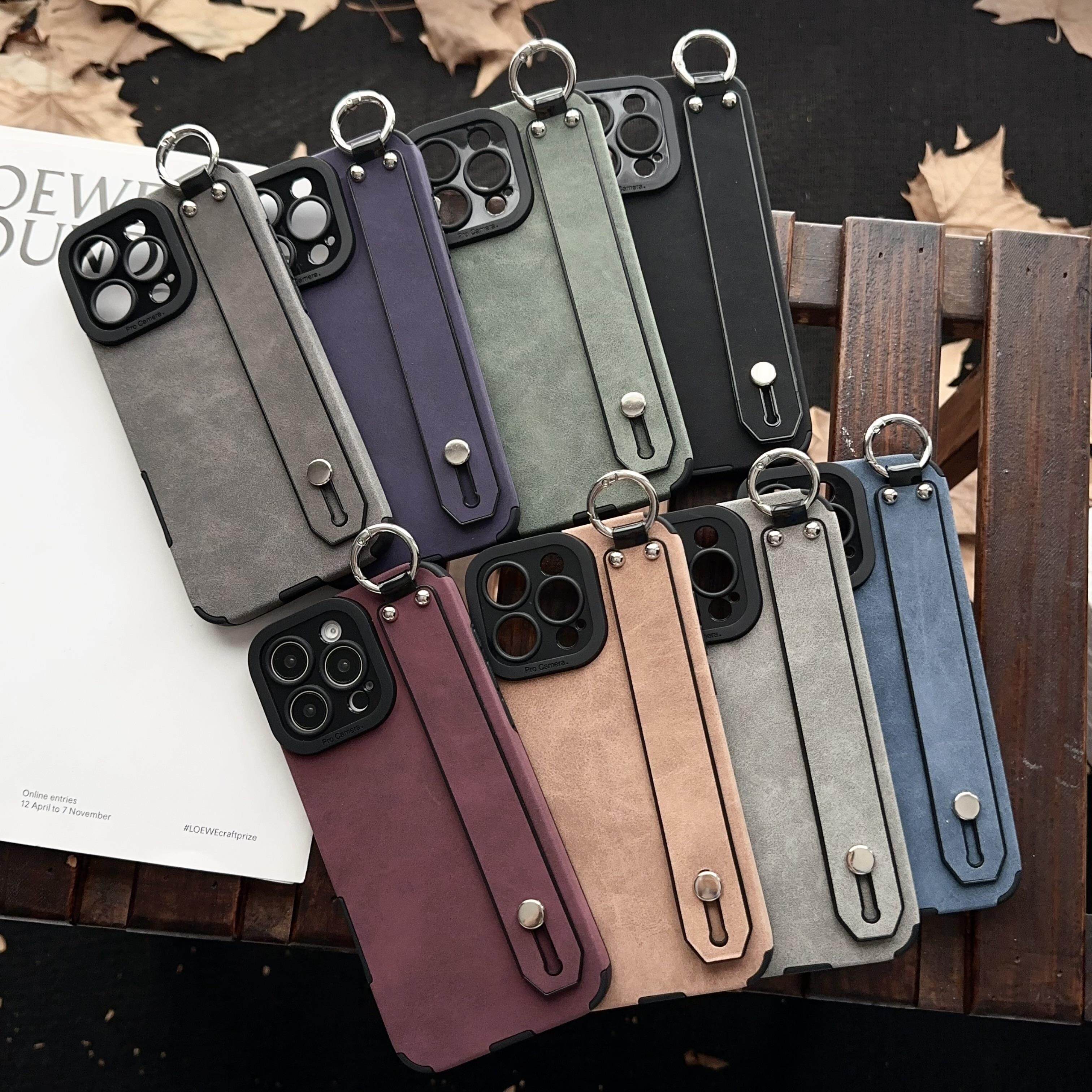 翻毛皮适用iPhone16手机壳15promax手腕带支架苹果14网红酒红色13pro简约皮质12高级感11硅胶软15plus防摔套