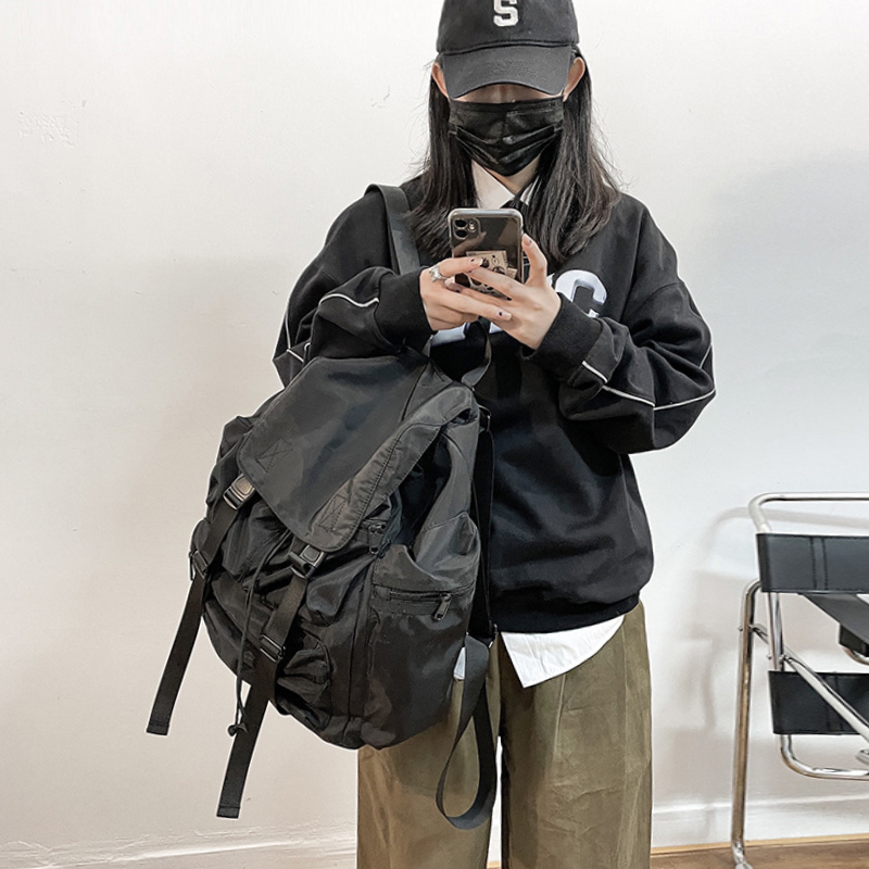 韩版潮牌暗黑系抽带双肩包尼龙防水男女书包户外大容量旅行背包