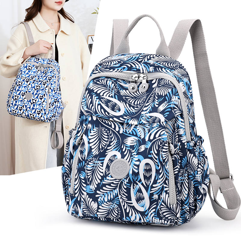 印花双肩包女2025新款背包时尚旅行大容量休闲百搭轻便牛津布书包