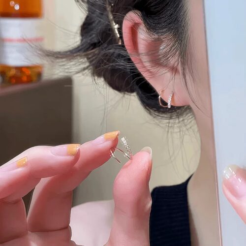 玫瑰金旋转不规则耳钉
