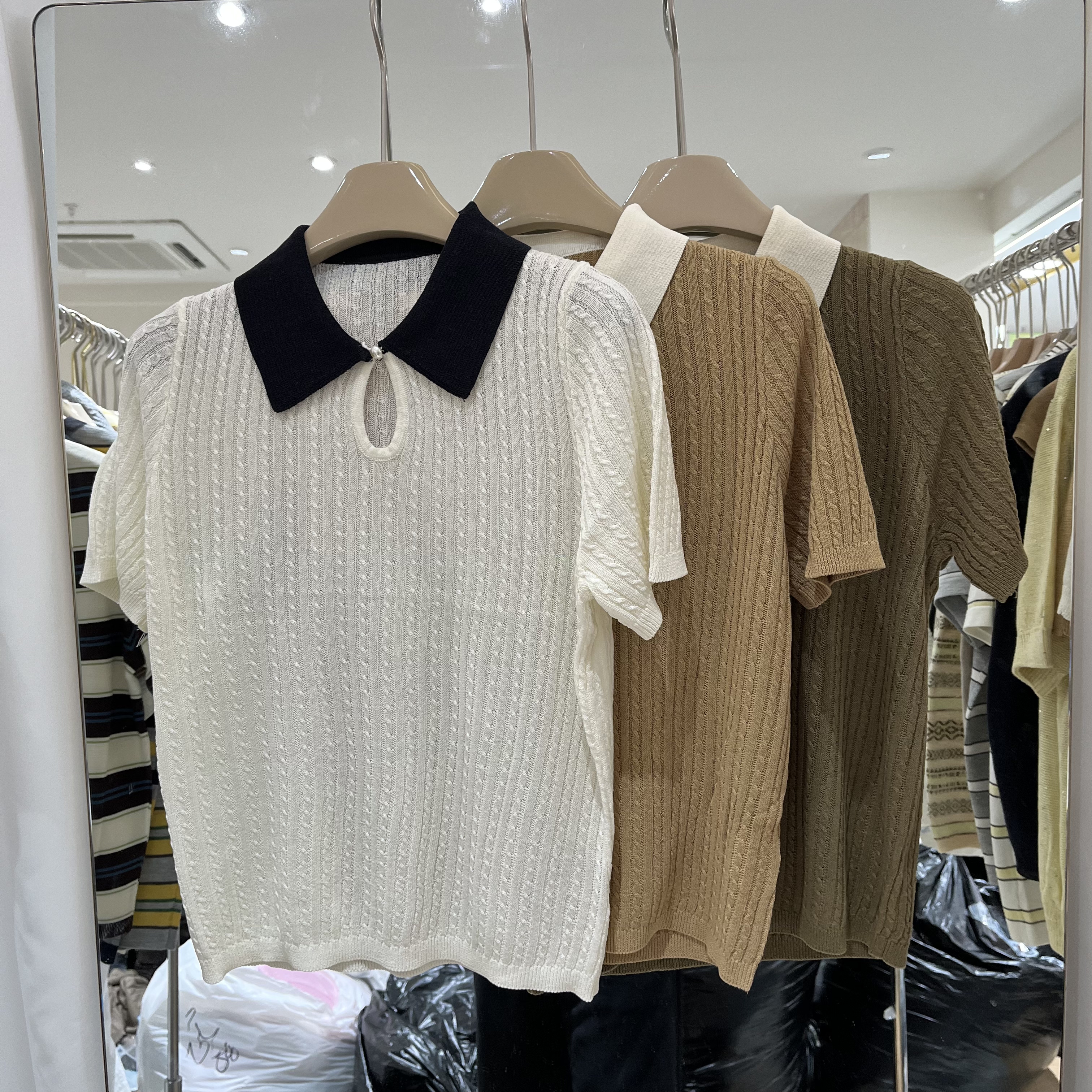 欧洲站2026春夏新款女士翻领拼色麻花纹竹节麻短袖欧货时尚针织衫