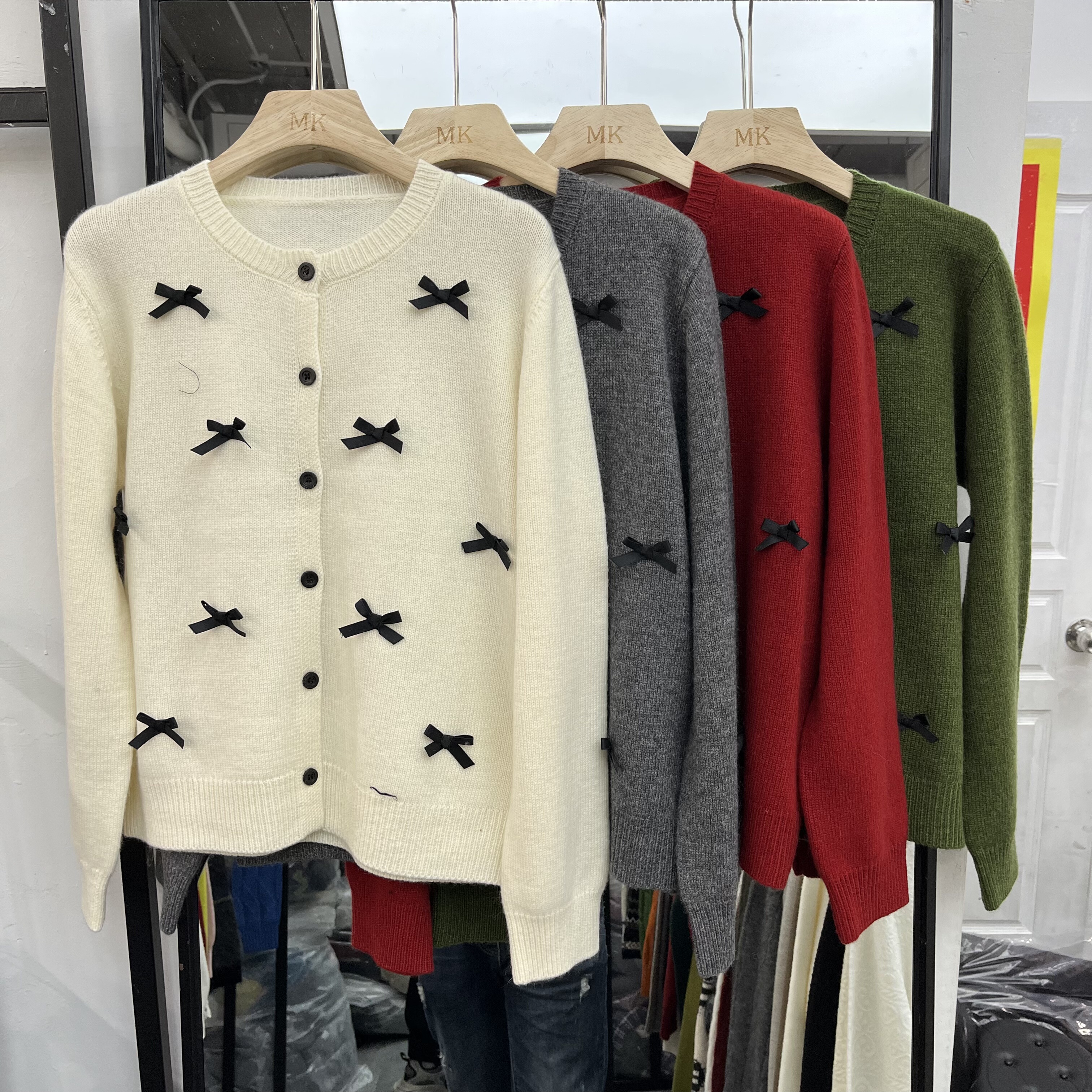 欧洲站2025秋冬新款女士蝴蝶结装饰羊绒羊毛长袖开衫欧货时尚针织