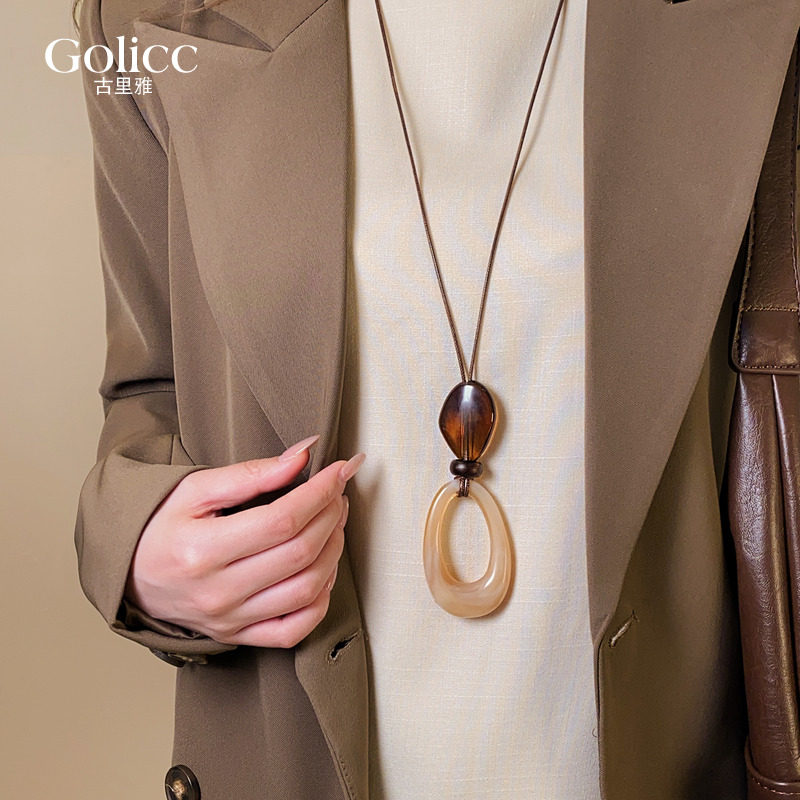 不规则咖色镂空水滴长项链高级感