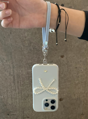 蓝色ins珍珠蝴蝶结适用iPhone17promax手机壳16Promax苹果14冷淡风12女13pro韩版女款腕带15皮链防摔高级简约