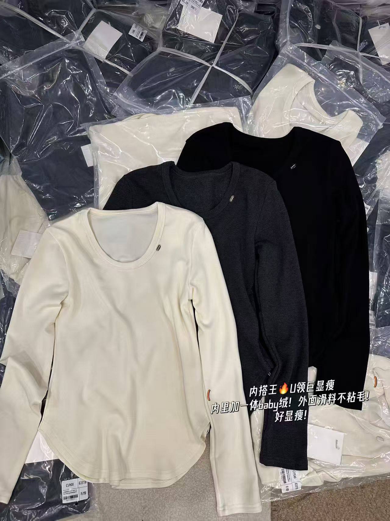 欧洲站2025冬时尚圆领金属扣下摆圆弧显瘦百搭长袖T恤内搭打底衫