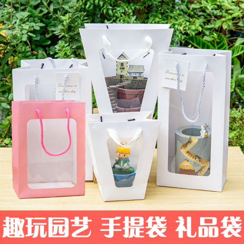 送礼开窗手提纸袋白色粉