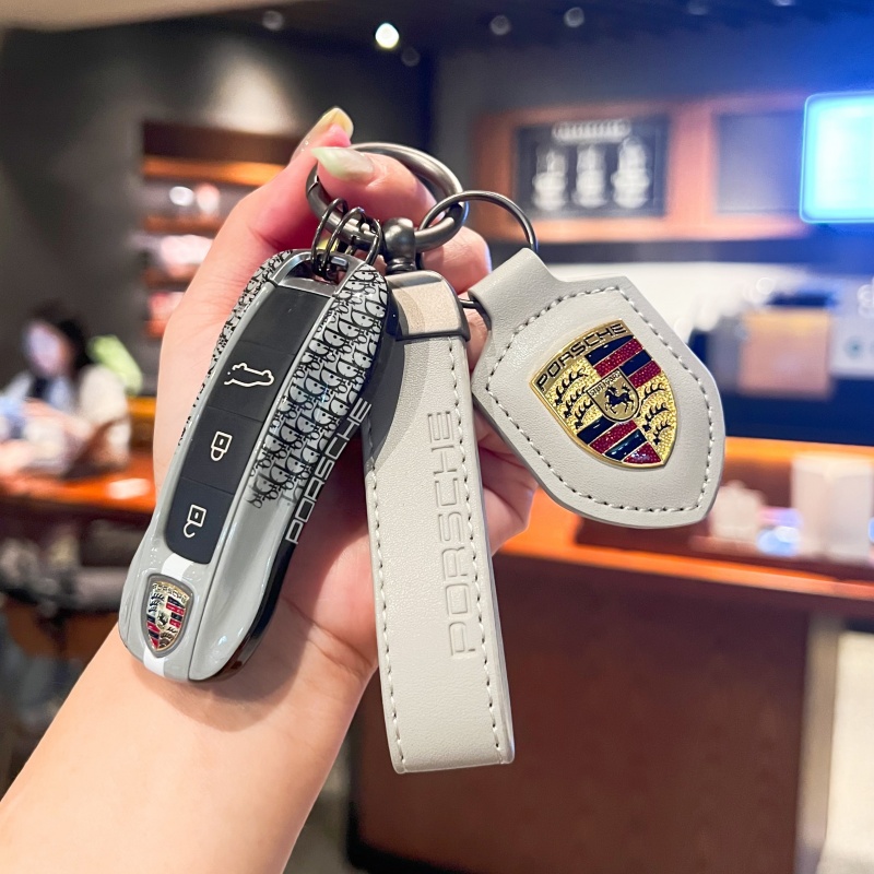 适用于保时捷卡宴Macan钥匙壳帕拉梅拉车911Taycan套718高档包扣