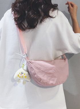 简约帆布包女2025新款休闲通勤单肩斜挎包休闲百搭运动旅游饺子包