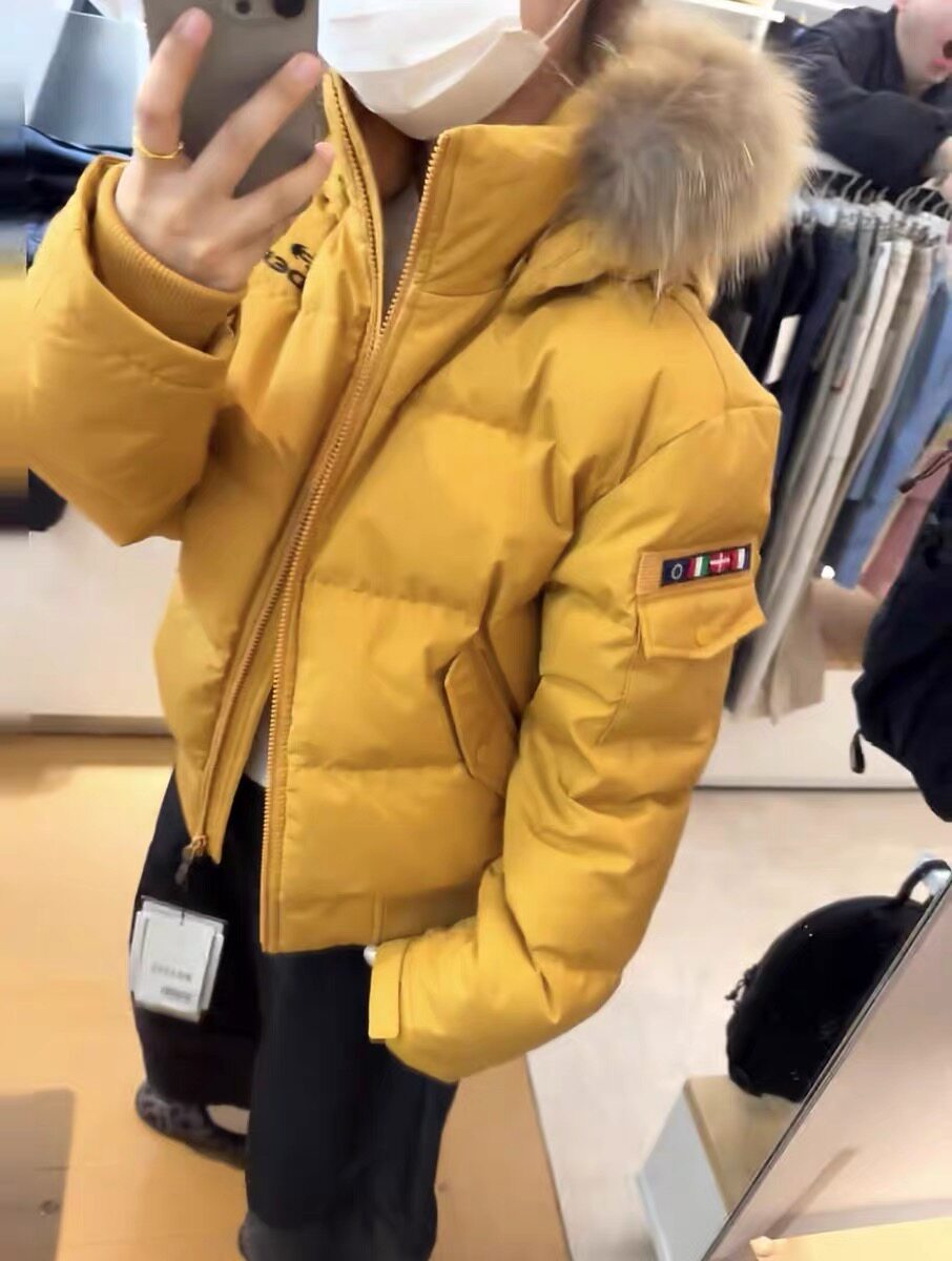橘色白鸭绒羽绒服女2025秋冬季新款小众高级感短款加厚面包服外套