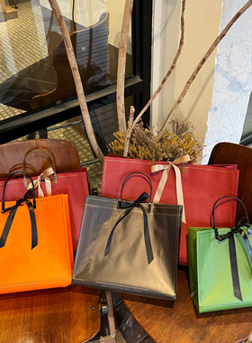 红色丝带款式手提袋绿色服装袋白色礼品袋复合塑料包装袋橙色袋子