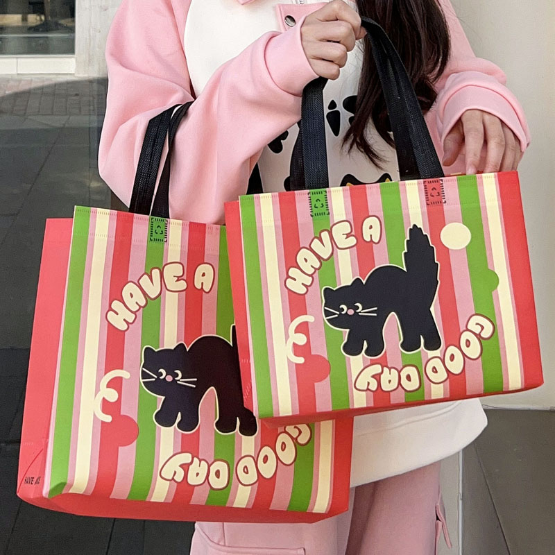 卡通黑猫手提服装袋女装童装包装袋礼品袋无纺布袋外卖袋可爱