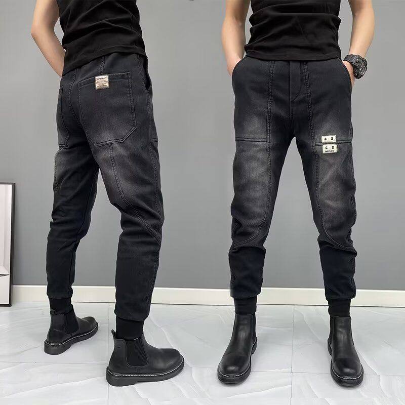 春秋新款修身潮流小脚休闲束脚裤潮牌哈伦牛仔裤配马丁靴的裤子男