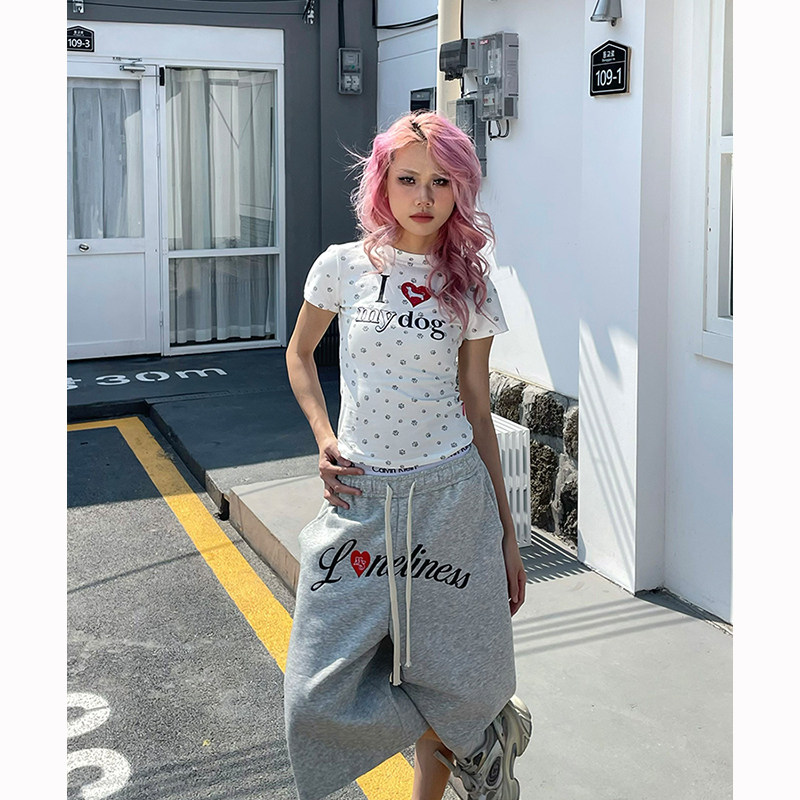 爱心字母刺绣迷彩七分裤