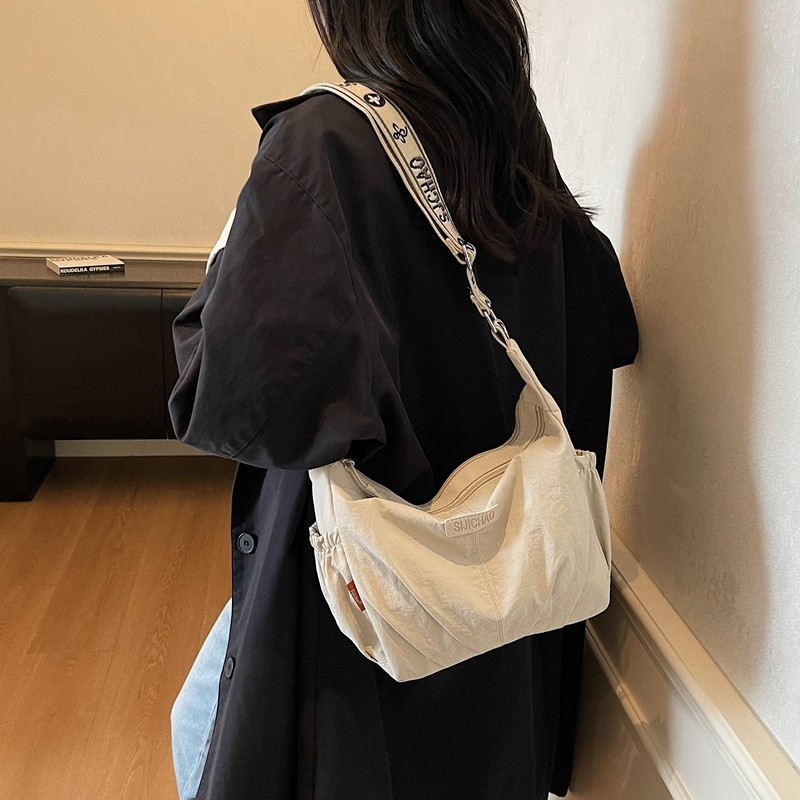 大容量双拉链斜挎包女2025新款简约通勤帆布包慵懒风轻便托特包