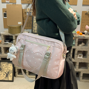 日韩透明波点粉色痛包女学生百搭手提斜挎包大容量上课通勤吧唧包