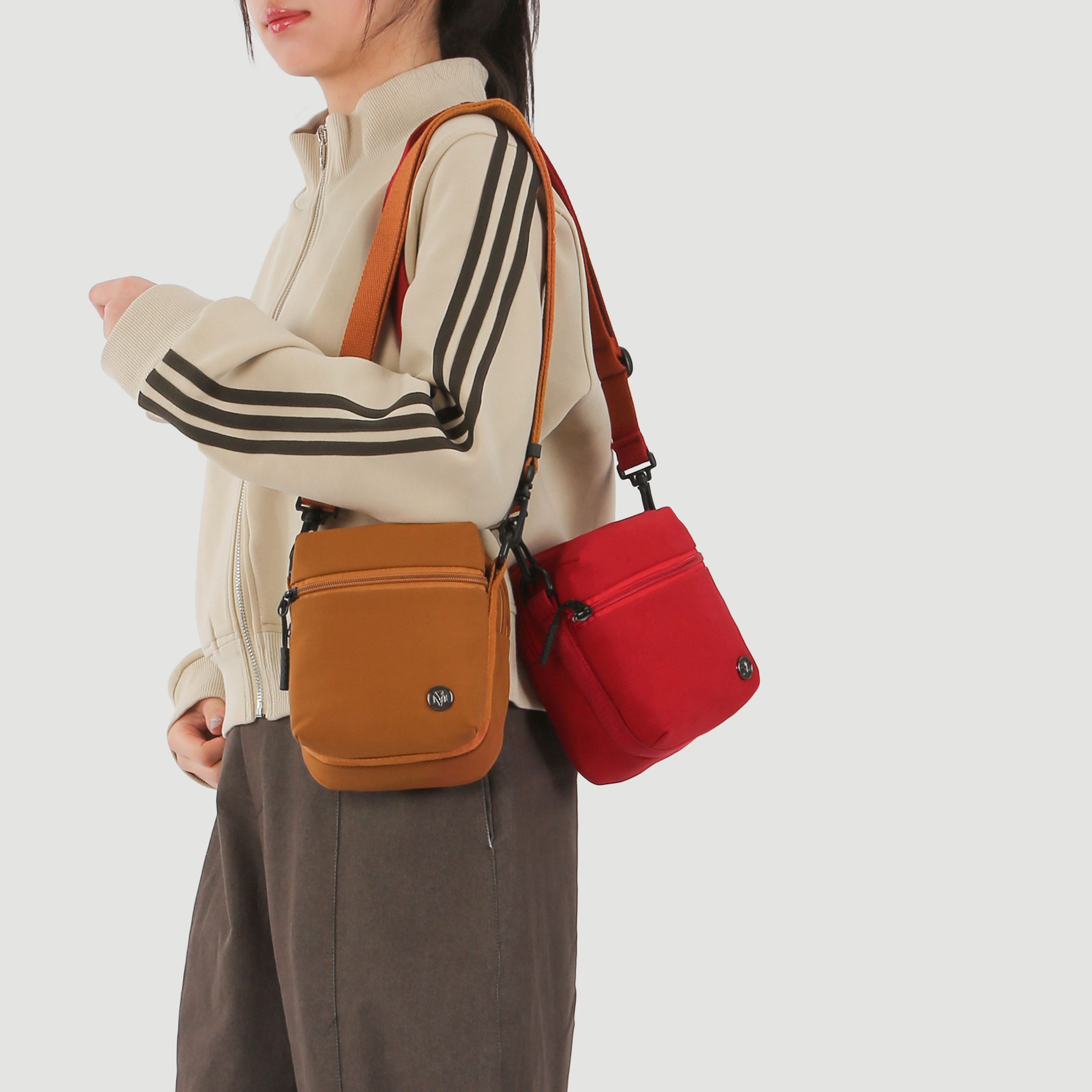 轻便手机包女斜挎包2026新款防水百搭迷你小包包多口袋单肩布包