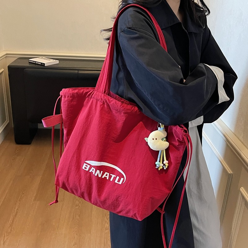 红色两用帆布包女2025新款大容量松弛感通勤背包手拎包休闲托特包