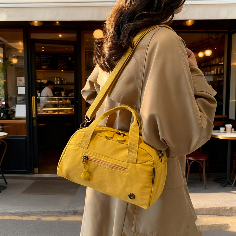 黄色帆布波士顿包女2025新款