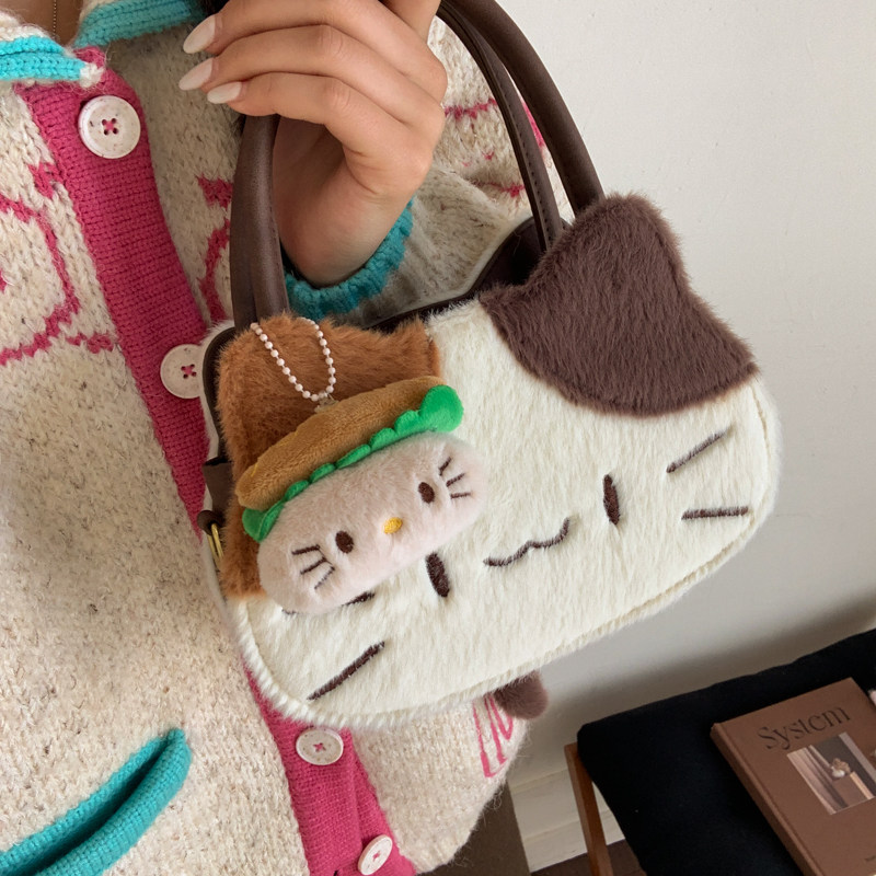可爱毛茸茸猫咪手提包女韩版新款小众高级感卡通斜挎女包生日礼物