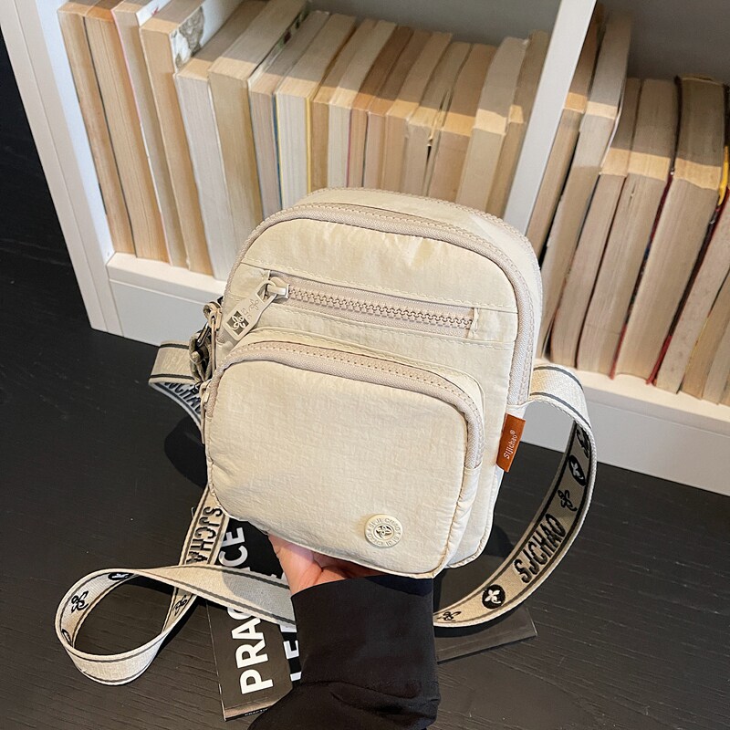 日系轻便帆布手机包女2026新款多口袋斜挎包高级感小众设计小挎包