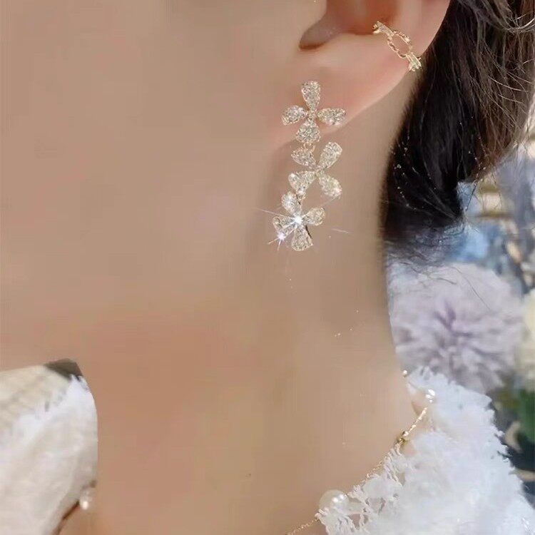 感不对称流苏花朵耳环女长款显脸瘦满钻银针新款轻奢超仙耳坠