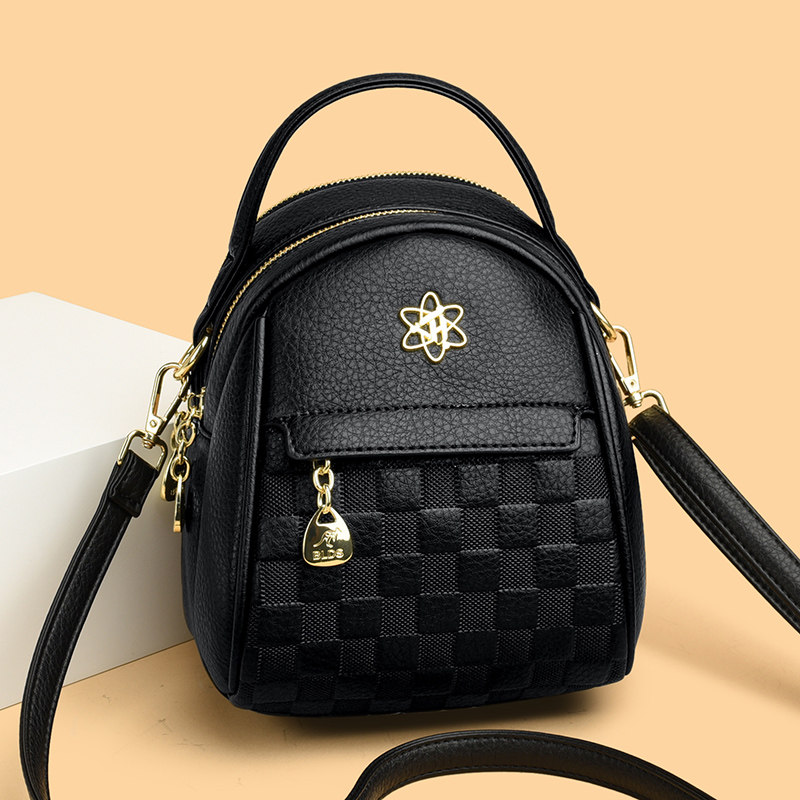 真皮女士手机包斜挎中年妈妈包2024新款大容量时尚单肩流苏小圆包