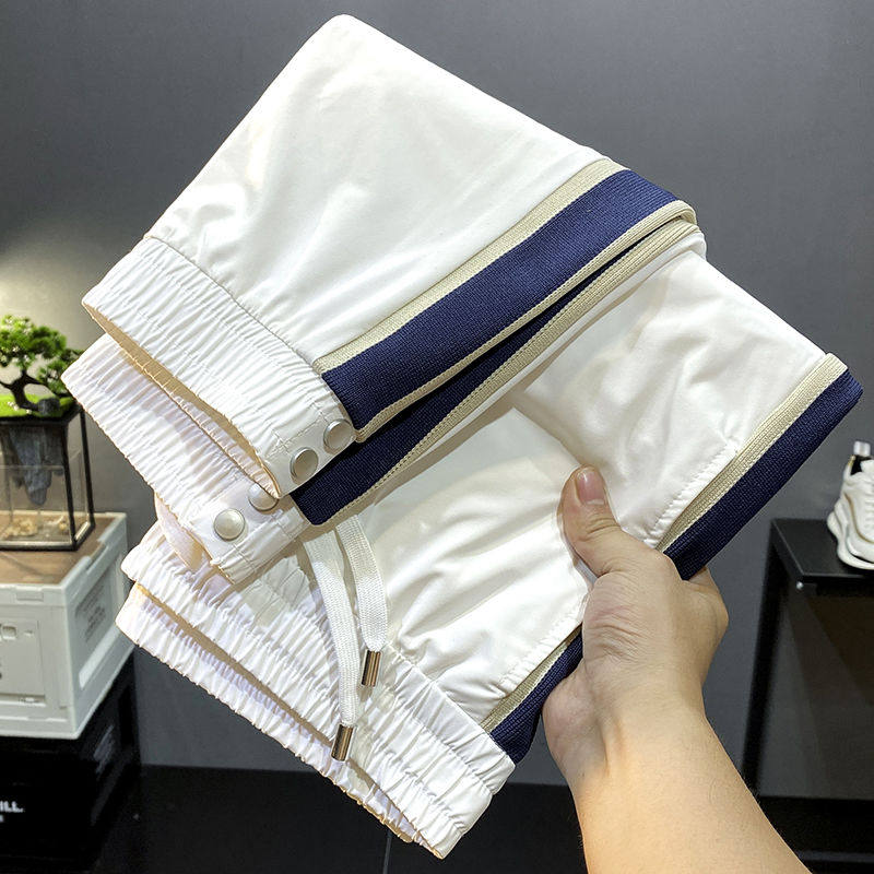 夏天白色超薄冰丝裤子男秋冬新款卫裤束脚哈伦运动九分休闲裤潮牌