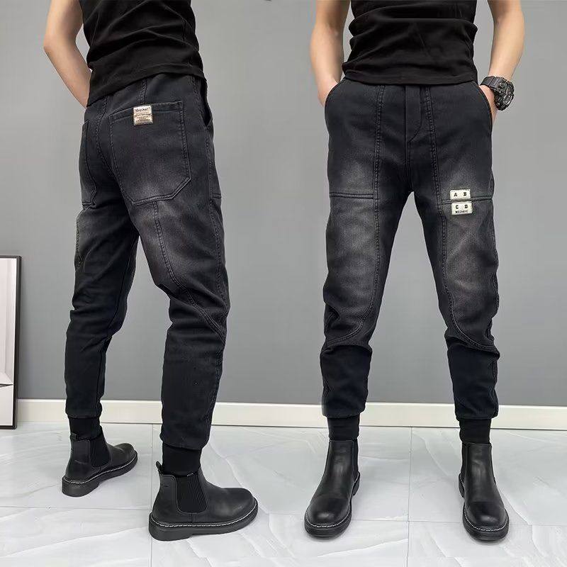 春秋新款修身潮流小脚休闲束脚裤潮牌哈伦牛仔裤配马丁靴的裤子男