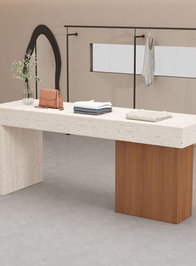 服装店中岛桌女装店铺中间流水台简约现代洞石纹展示桌鞋包中岛台