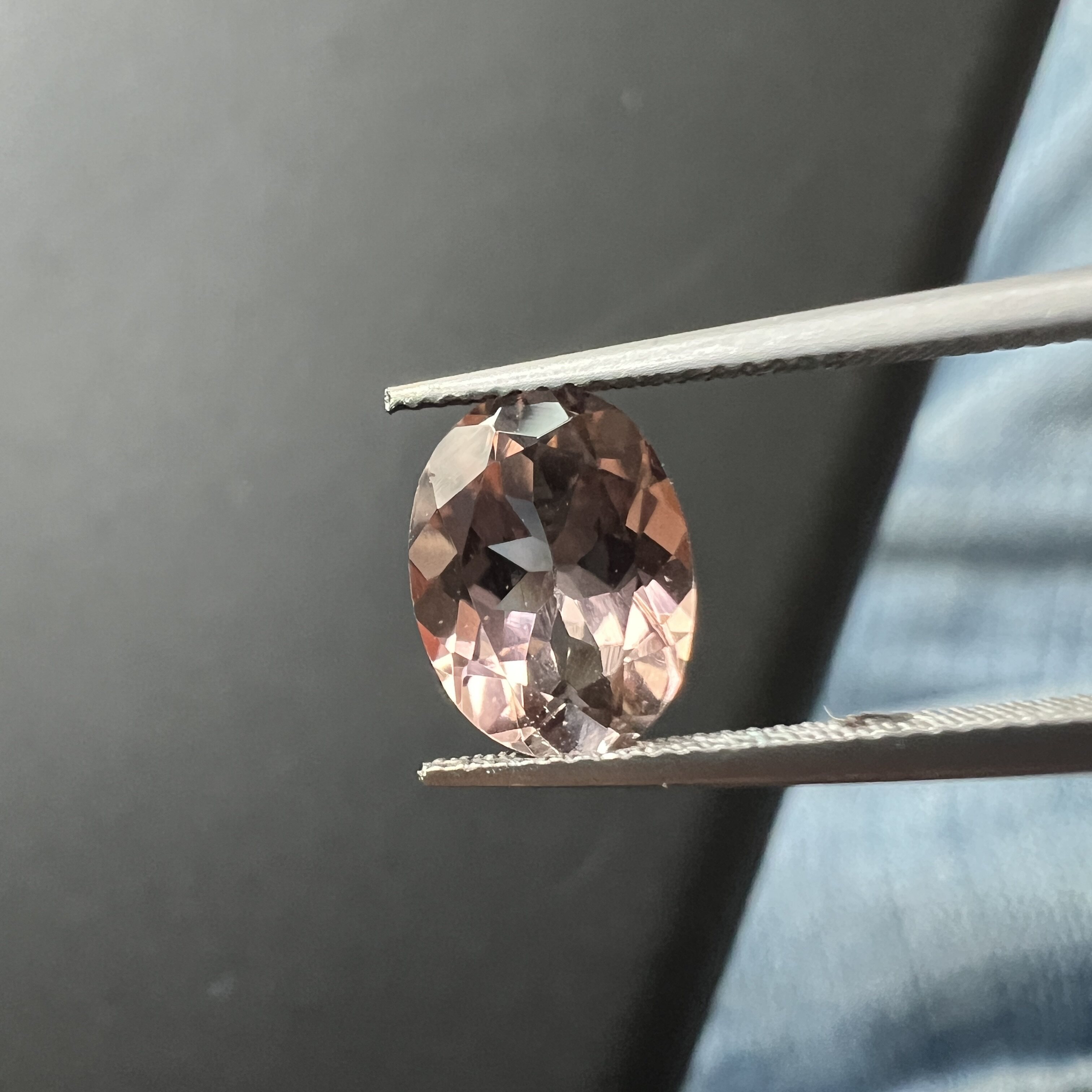 1.2克拉橙灰色碧玺全净体椭圆形精切6*8mm