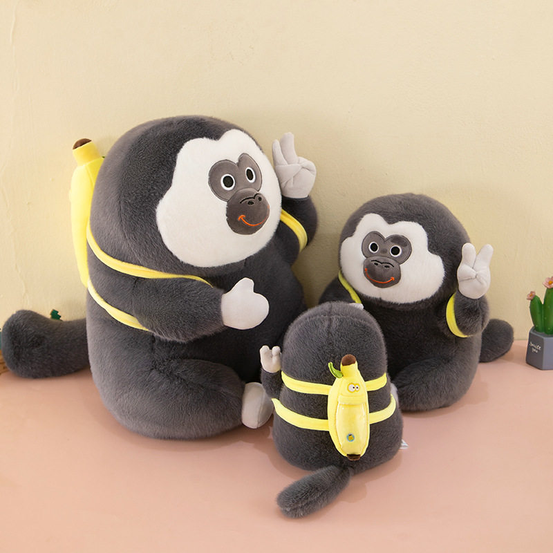 跨境白面猴香蕉猴子毛绒玩具新款丑萌猴子玩偶抱枕公仔生日礼物