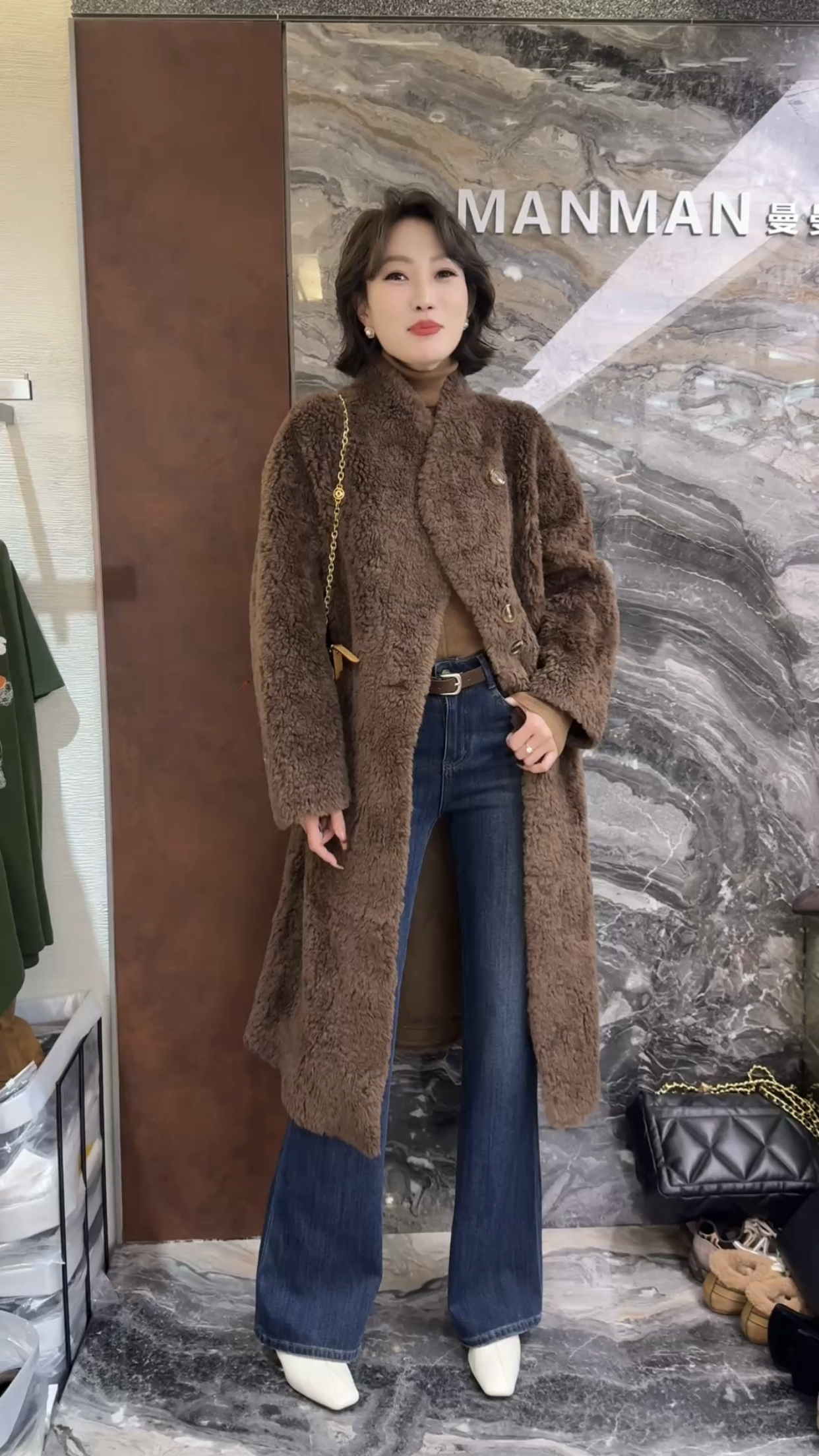 欧洲站2025冬季新款v领单排扣轻熟风宽松百搭中长款过膝毛呢大衣