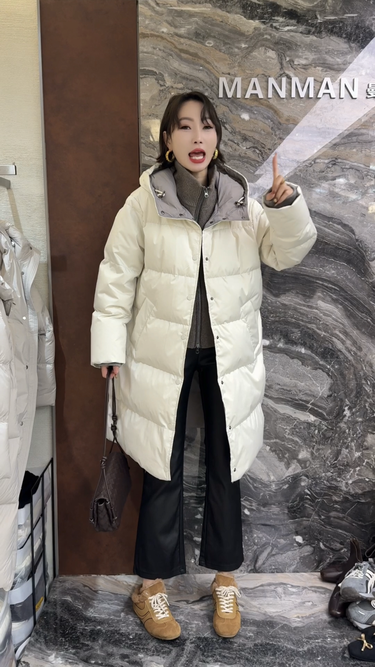 欧洲站2025冬季新款连帽针织拼接时尚百搭中长款保暖羽绒服外套潮