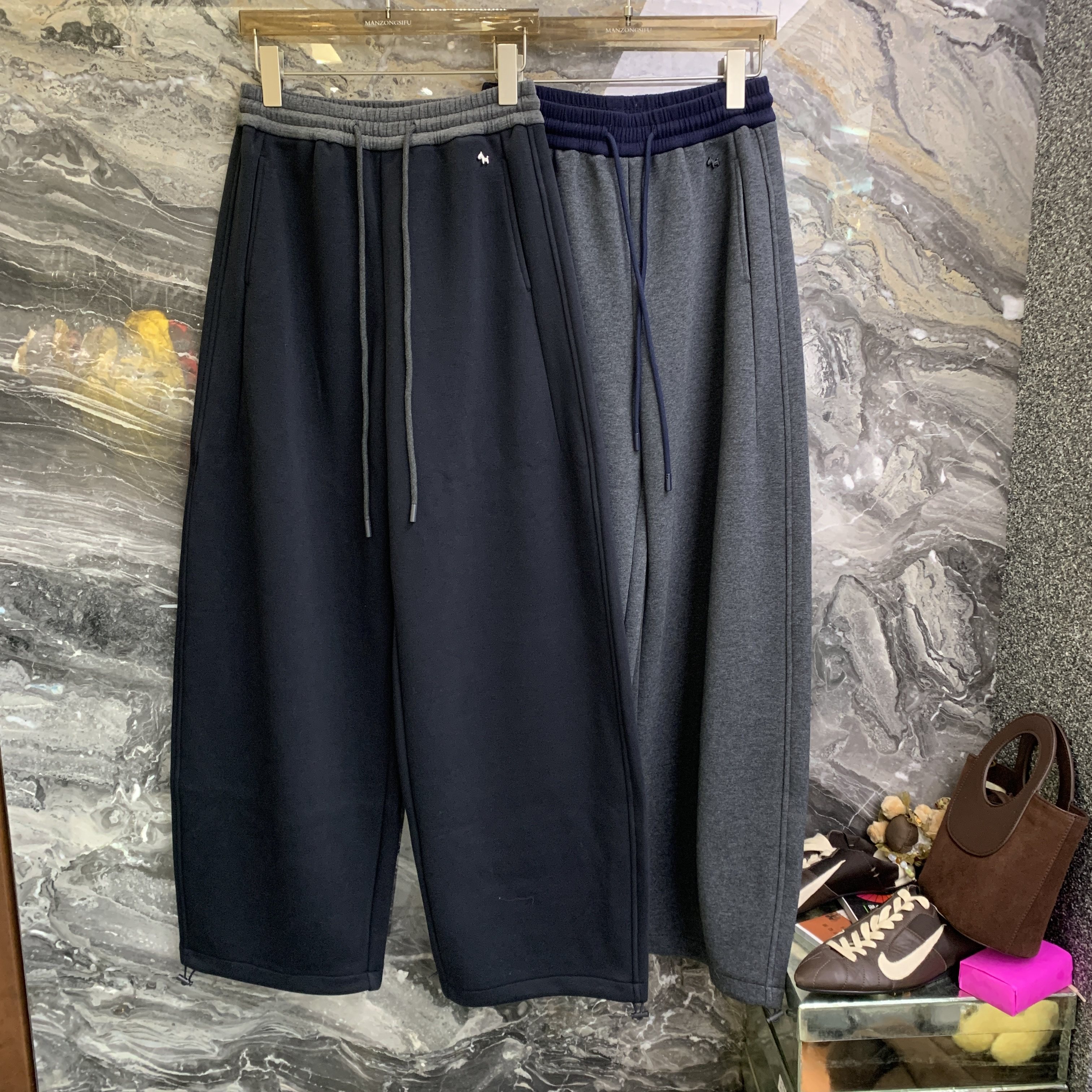 欧洲站2025冬季新款松紧高腰抽绳宽松垂感阔腿加厚弯刀卫裤261111