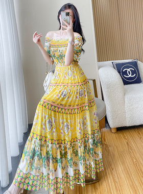 波西米亚一字肩印花连衣裙女夏季新款黄色仙女飘逸度假沙滩裙长裙