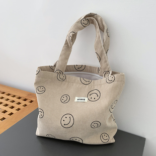 2025新款韩系百搭ins灯芯绒笑脸手提小包日常饭盒小号杂物手提包