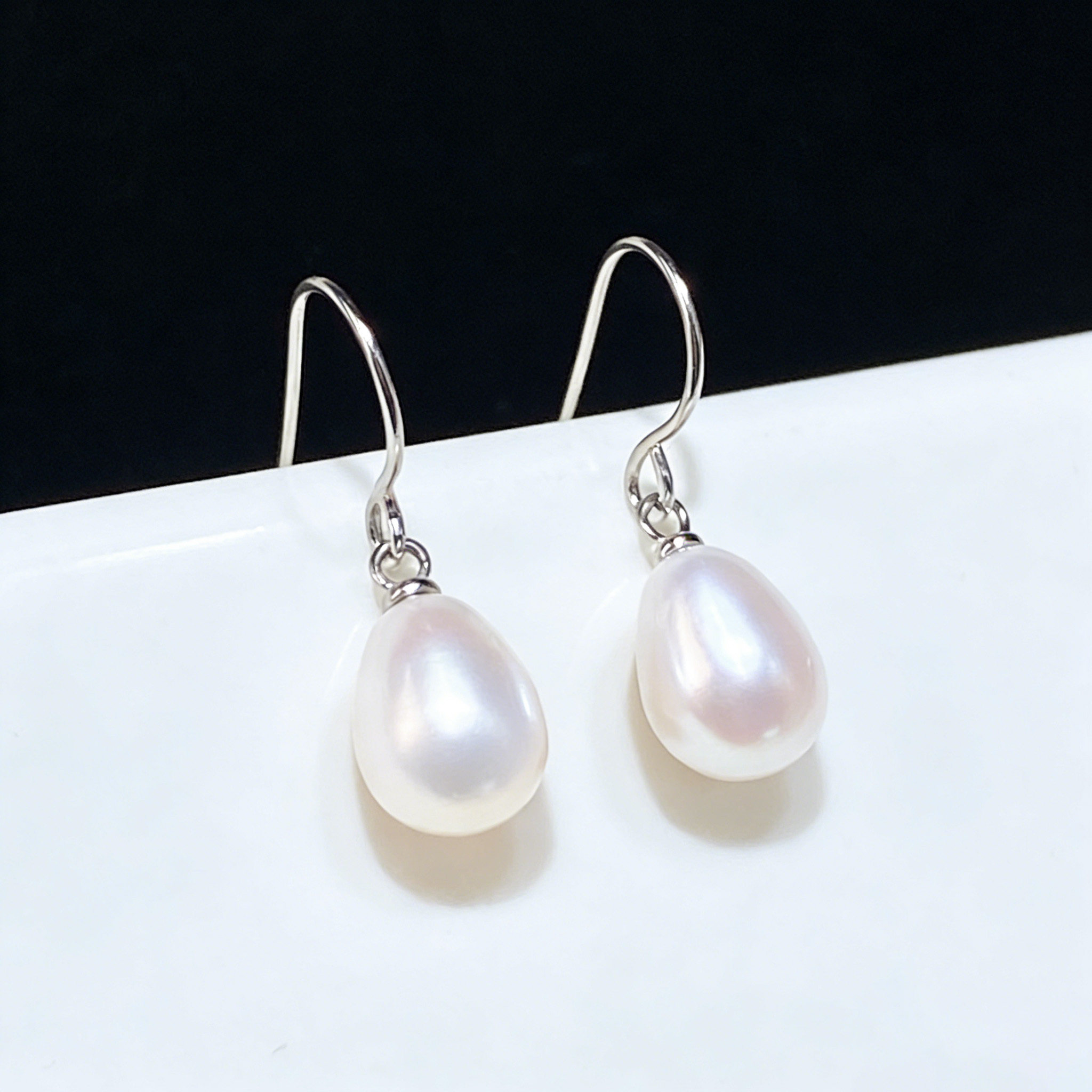 s925纯银水滴形天然淡水真珍珠耳环气质百搭耳坠椭圆吊坠耳钩女士