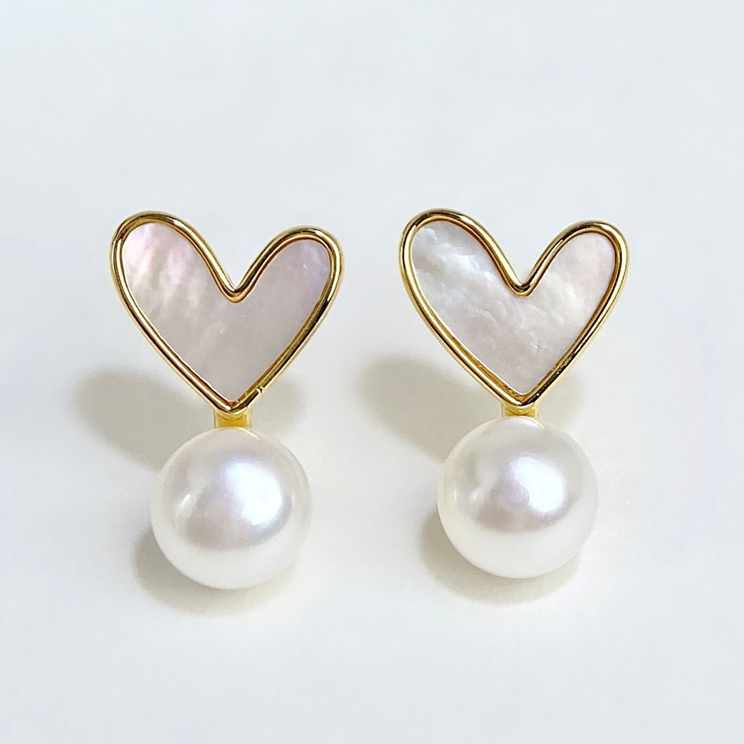 贝壳爱心天然淡水珍珠耳钉女时尚精致小清新高级感纯银针珍珠耳饰