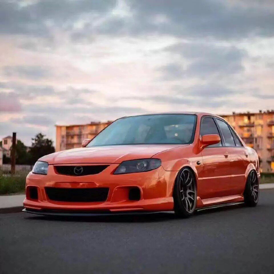 适用于马自达323改装美版大包围福美来日版mps前后杠鹰眼日规侧裙