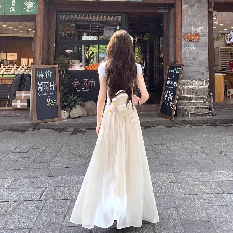 杏色超仙流光纱高腰a字半身裙女