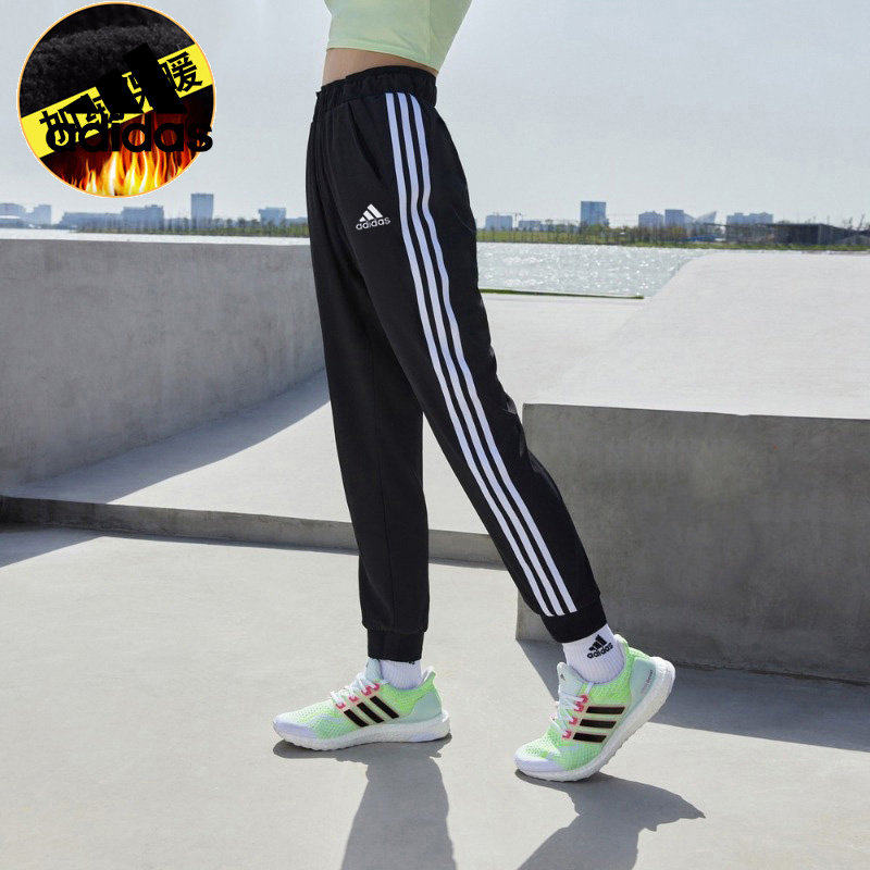 Adidas阿迪达斯女裤新款加绒保暖经典三条纹小脚裤运动长裤