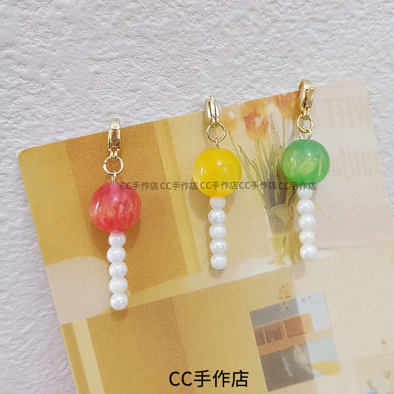 CC手作原创小众极光棒棒糖女包挂件翻包零钱包拉链扣头耳机包挂