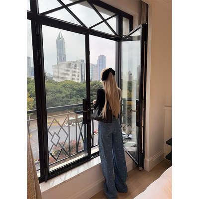 skibyTannin刺绣花花牛仔裤