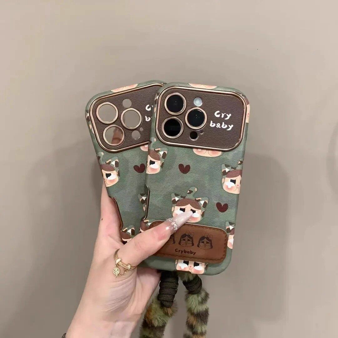 秋冬皮质高级感适用苹果17promax手机壳16plus带支架手提挂绳iPhone15/14/13Pro轻奢新款17pm镜头全包保护套