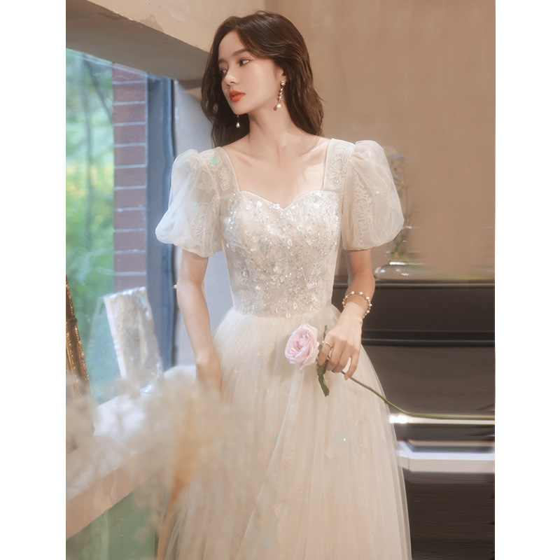 香槟色晚礼服2025新款气质仙气连衣裙法式主持人中长款宴会晚礼服