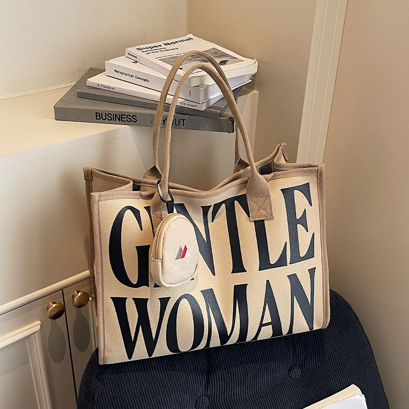 字母帆布包女2025新款时尚大容量手提袋通勤包外出轻便单肩托特包
