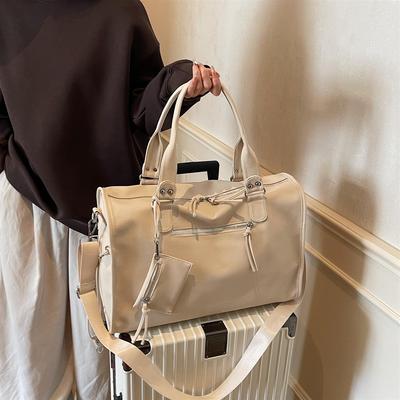 大容量包包女2025新款高级感机车风短途旅行包女士外出通勤手提包