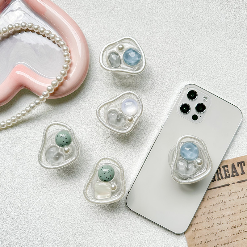 女新款韩国ins风手机气囊支架宝石珍珠粘贴式可伸缩稳固背贴便携