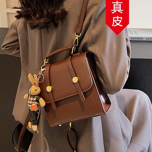 香港品牌真皮双肩包书包