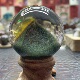 天然绿幽灵金字塔球摆件直径40.3毫米花幽灵山水晶球黄胶花